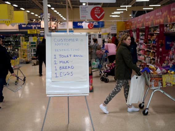 Remember this? A board displays shopping restrictions at a Tesco supermarket back in March 2020. PIC: Getty