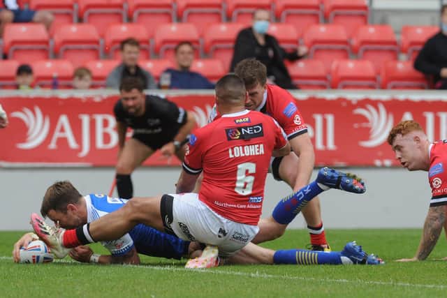 Richie Muyler scores for Rhinos in last month's win at Salford. Picture by Steve Riding.