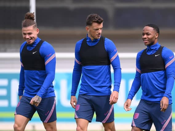 BACK TO IT: For Leeds United's England international midfielder Kalvin Phillips, left, pictured alongside Three Lions team mates Ben White, centre, and Raheem Sterling, right, during the Euros. Photo by Laurence Griffiths/Getty Images.