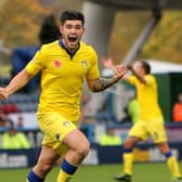Alex Mowatt celebrates scoring against Huddersfield Town at the John Smith's Stadium in November 2015. PIC: Varley Picture Agency