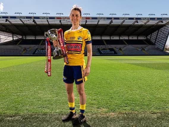 Rhinos captain Coutney Winfield-Hill with the Women's Super League trophy. Picture by SWpix.com.