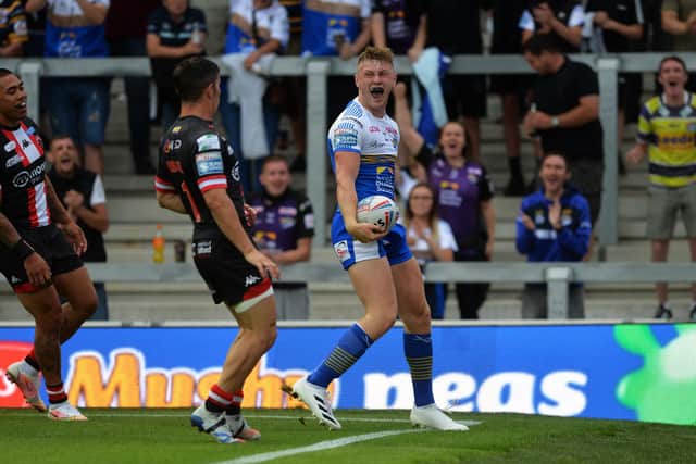 Up and running: Leeds' Harry Newman celebrates scoring the opening try.Picture: Jonathan Gawthorpe