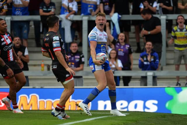 Up and running: Leeds' Harry Newman celebrates scoring the opening try.

Picture: Jonathan Gawthorpe