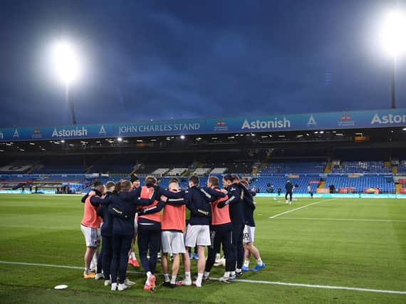 Leeds United's players huddle at Elland Road. Pic: Getty