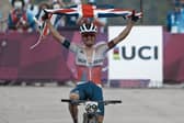 Leeds's won Tom Pidcock celebrates as he crosses the finish line to win the gold medal during the men's cross country mountain bike competition. PIC: PA