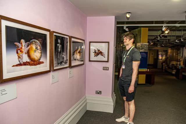 Marek Romaniszyn, assistant community curator with the Mixed Notes exhibition in the community corridor at Leeds City Museum.

 Picture: Tony Johnson