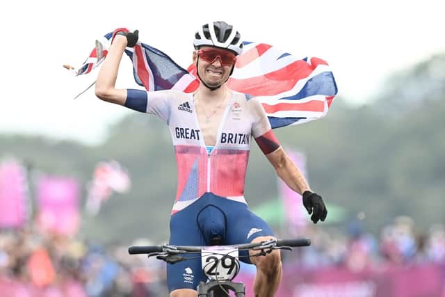 GOLDEN BOY: Tom Pidcock celebrates as he wins the men's cross-country race and is crowned Olympic Champion. Picture by Alex Broadway/SWpix.com