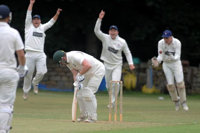 Alex Atkinson of Otley slumps as he is caught by Beckwithshaw wicketkeeper Miles Buller for five off the bowling of Joe Holderness. Picture: Steve Riding.