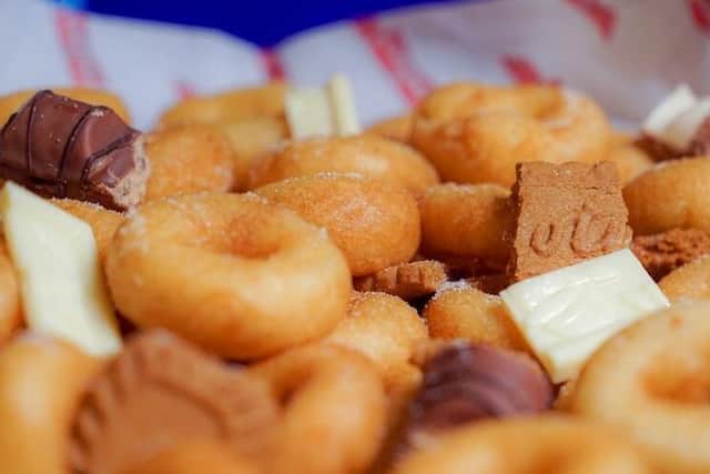 Big Phillies offers platters of freshly cooked sugar doughnuts, loaded with the drizzle of your choice
