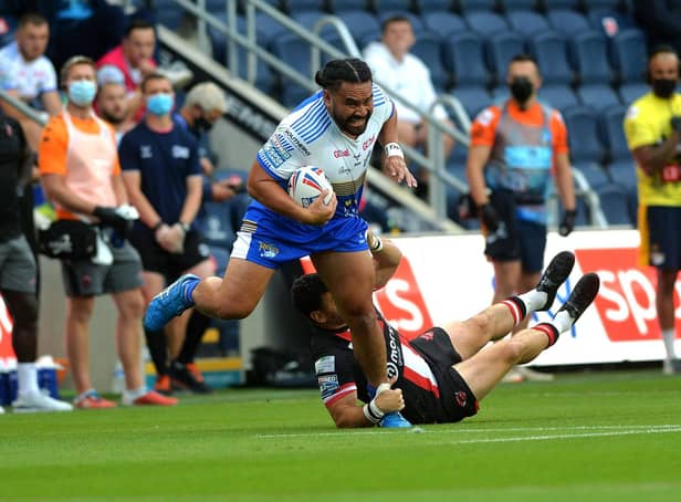 Konrad Hurrell on the charge for Rhinos against Salford.