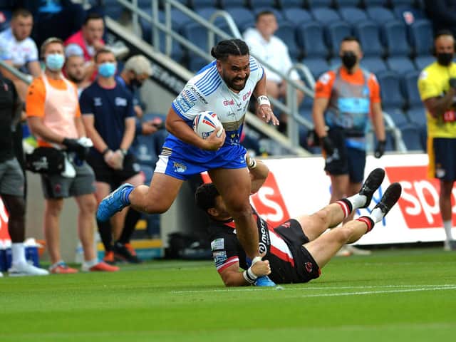 Konrad Hurrell on the charge for Rhinos against Salford.