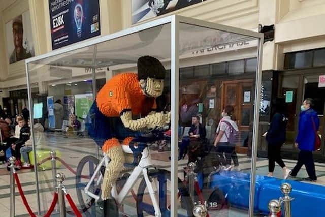 'Unique' Lego cyclist statue on display at Leeds Station to be auctioned for charity