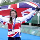 Great Britain's Georgia Taylor-Brown celebrates with her silver medal after the Women's Triathlon at the Odaiba Marine Park (Picture: PA)