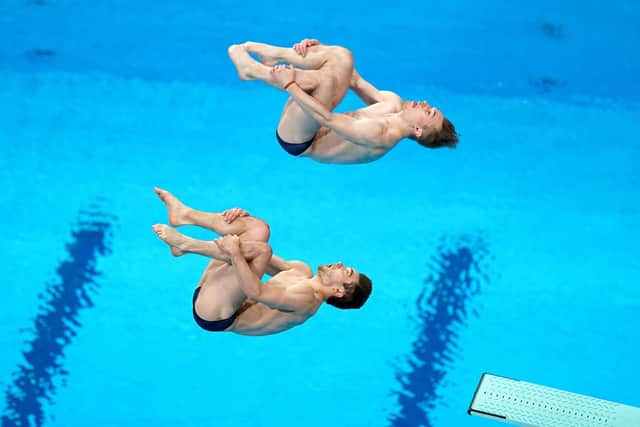 Daniel Goodfellow and Jack Laugher, top, pictured during the Men's Synchronised 3m Springboard Final at the Tokyo Aquatics Centre, where they finished seventh. Picture: Mike Egerton/PA