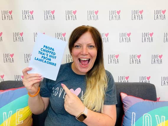 Love Layla founder Stacey Dennis holding the card.

Photo: Campfire PR / SWNS