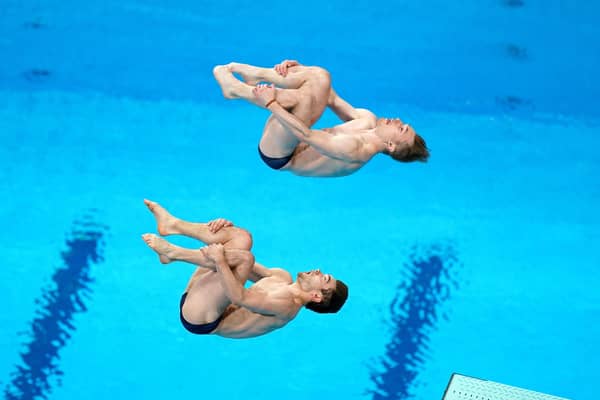 NOT TODAY: Dan Goodfellow and Jack Laugher, top, pictured on their way to finishing seventh in the Men's Synchronised 3m Springboard Final at the Tokyo Aquatics Centre. Picture: Mike Egerton/PA