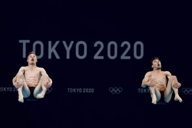 OUT OF TOUCH: Daniel Goodfellow and Jack Laugher compete during the Men's Synchronised 3m Springboard final at Tokyo Aquatics Centre. Picture: Clive Rose/Getty Images