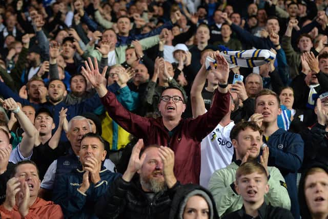 WE'RE BACK! Leeds United's away fans in Wednesday evening's pre-season friendly against Blackburn Rovers at Ewood Park. Picture by Jonathan Gawthorpe.