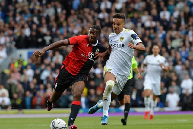FIRST PRE-SEASON: For record signing Rodrigo, right, at Leeds United having only arrived at the club last August. The forward is pictured challenging Tyler Magloire in Wednesday's friendly at Blackburn. Picture by Jonathan Gawthorpe.