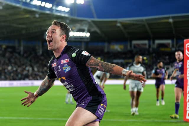 Richie Myler celebrates his try. Picture by Jonathan Gawthorpe.