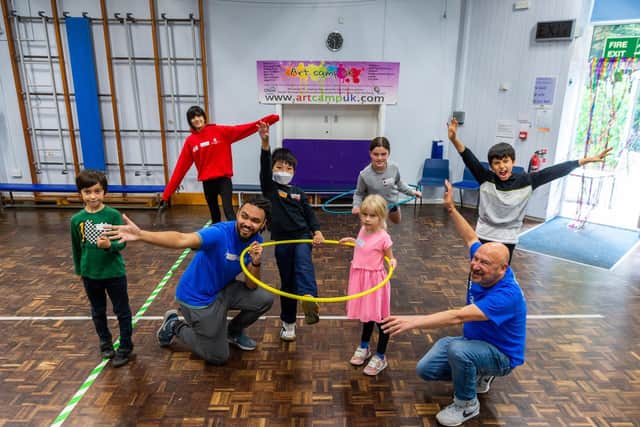 Children enjoying a drama class run by Alex Dunlop, left, pictured with Art Camp UK director Jon Wiltshire, right