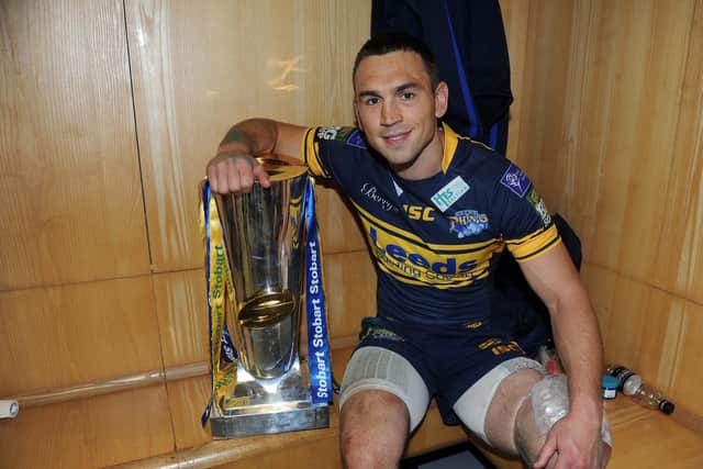 Kevin Sinfield with the Super League trophy in the Old Trafford changing room after the 2012 Grand Final. Picture by Steve Riding.