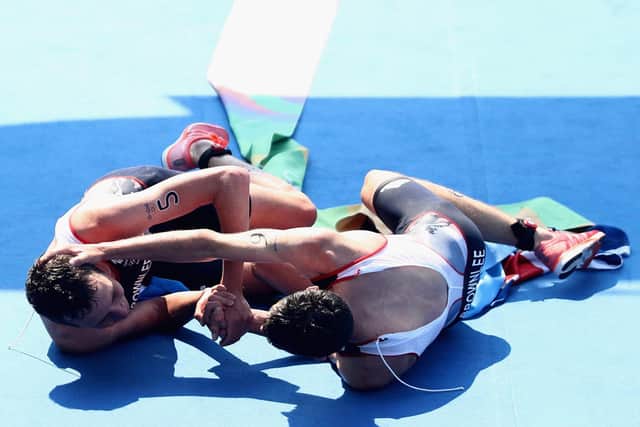 BROTHERS IN ARMS: Jonny and Alistair Brownlee after their silver and gold medals wins at Rio 2016. Picture: Getty Images.