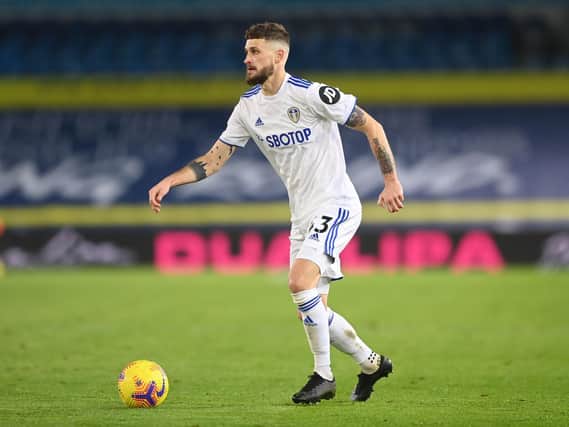 REUNION: On the cards for Mateusz Klich, above, with Leeds United's fans in the Premier League opener at Manchester United. Photo by Michael Regan/Getty Images.