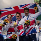 The team from Britain celebrates after winning the gold medal in the mixed relay triathlon at the 2020 Summer Olympics. Picture: AP Photo/Francisco Seco.