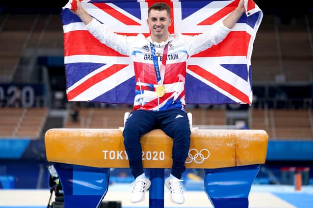 MAIN MAN: Max Whitlock celebrates with his gold medal after winning the Men's Pommel Horse Final at the Ariake Gymnastics Centre. Picture: Mike Egerton/PA