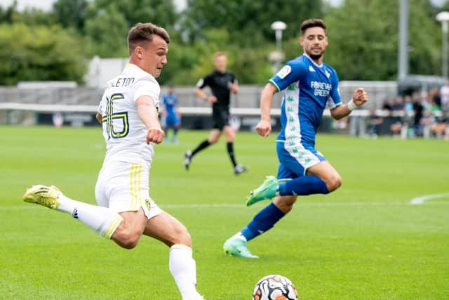 TAKING HIS CHANCE: Leeds United's Jamie Shackleton, left, sends in another cross as the 21-year-old impresses from the bench in Saturday's pre-season friendly against Real Betis in Loughborough. Picture by Bruce Rollinson.