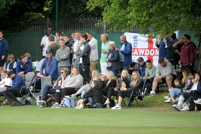 Rawdon fans support their side from the boundary during the Waddilove Cup final. Picture: Steve Riding.