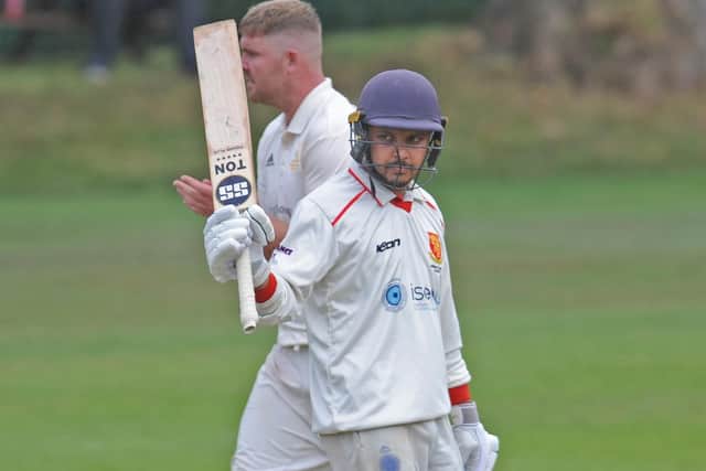 Krutik Patel acknowledges the crowd during his innings of 142 for Pool in the Waddilove Cup final. Picture: Steve Riding.