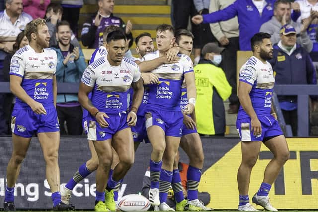 Harry Newman is congratulated by team-mates after scoring against Warrington. Picture: Allan McKenzie/SWpix.com.