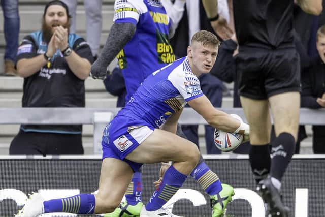 Leeds Rhinos' Harry Newman touches down against Warrington. Picture: Allan McKenzie/SWpix.com.