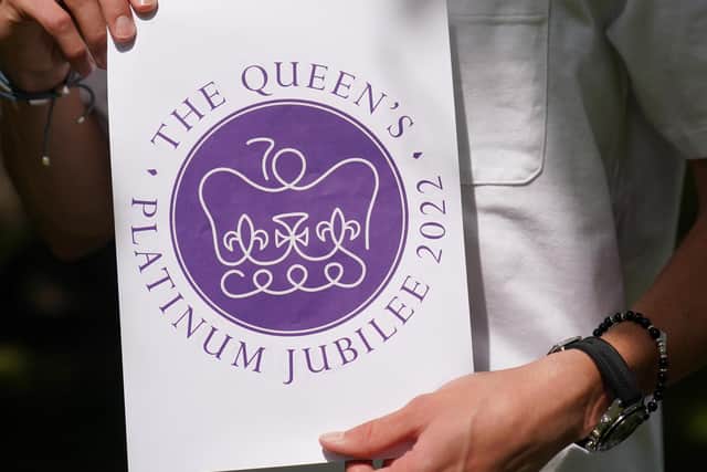 The 19-year-old’s winning purple and white entry features a stylised crown, incorporating the number 70, on a round background similar to a royal seal. Picture: Jacob King/PA Wire