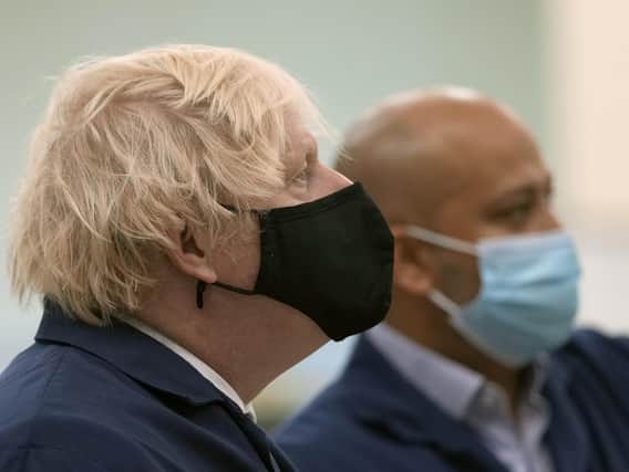 Prime Minister Boris Johnson (left) during a visit to the Airbus Defence and Space plant in Stevenage, Monday August 2 (PA/Alastair Grant)