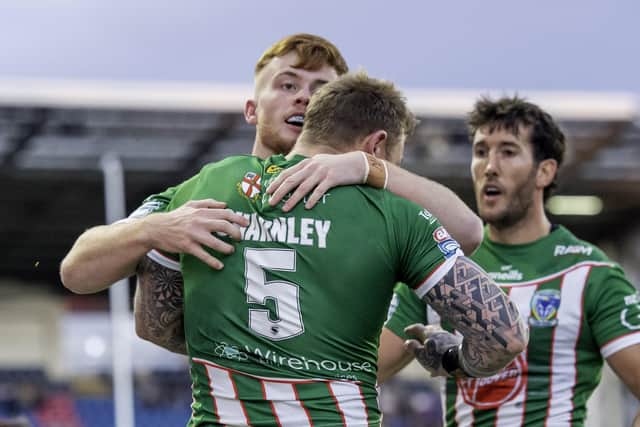 He said yes: Warrington's Josh Charnley is congratulated by Ellis Longstaff on scoring that try. Picture by Allan McKenzie/SWpix.com
