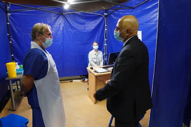 Health Secretary Sajid Javid talking to staff during a visit to the Bournemouth Vaccination Centre, in Bournemouth, Dorset. (PA/Steve Parsons)