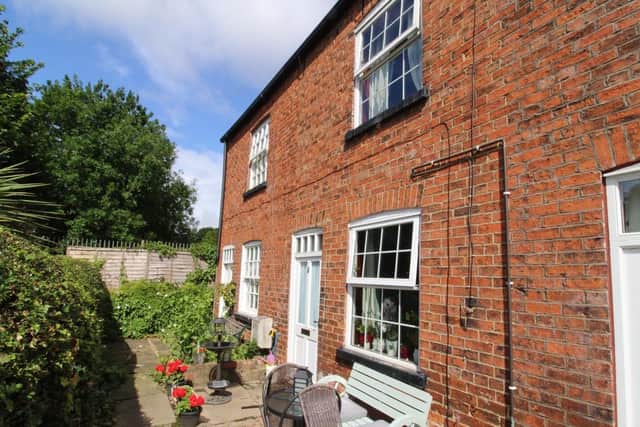 Set in a private secluded approach, this traditional terraced property is full of character and charm. The house sits on New Row in Colton, and has a kitchen, living room, generous double bedroom and family bathroom. It also boasts period features like the beamed ceilings.It is on the market for 185,000 with Strike.