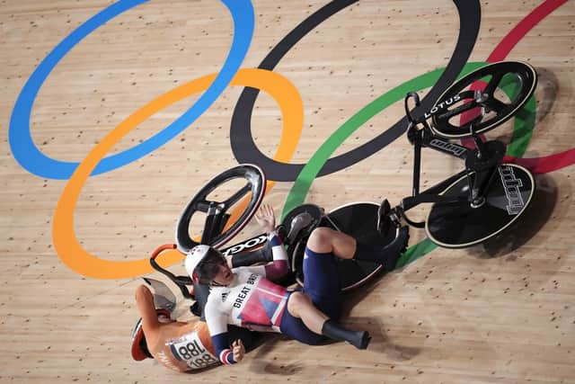 Collision: Leeds star Katy Marchant crashes with Laurine van Riessen of Team Netherlands during the track cycling women keirin. Picture: AP Photo/Christophe Ena