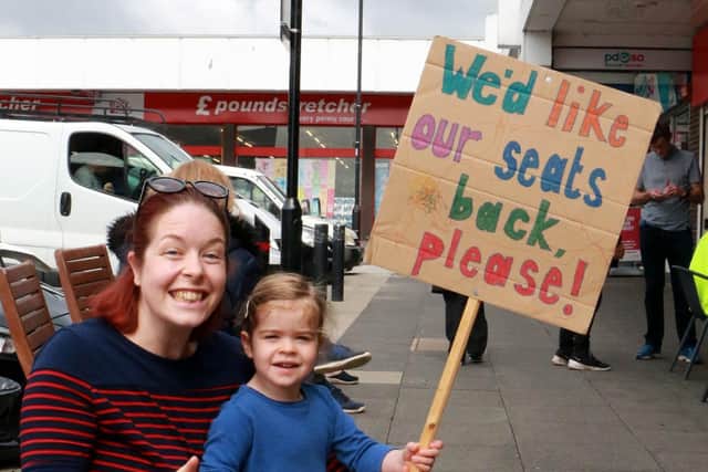 Campaigners in the A Place to Sit group, made up of 900 Bramley residents, at a sit-in protest in Bramley Shopping Centre, after the benches were removed.