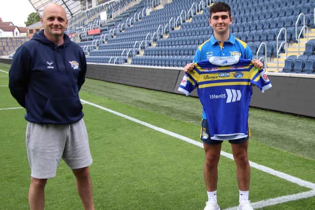 Jack Sinfield with Rhinos coach Richard Agar. Picture c/o Leeds Rhinos.