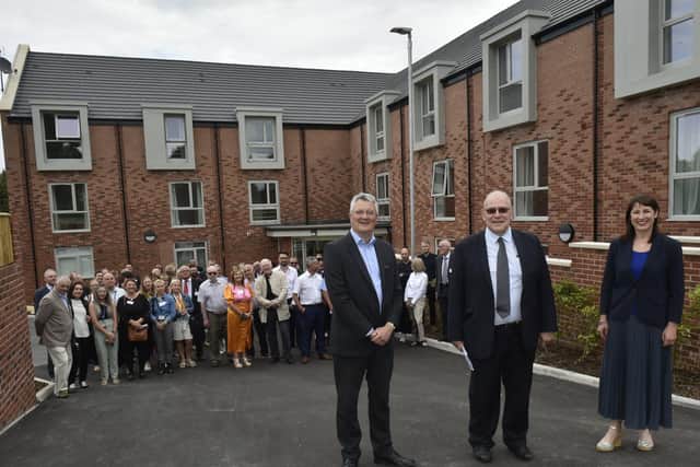 Pictured at the opening of Don Robins' House in Hedley Chase, Leeds are James Lewis, Leader of Leeds City Council who officially opened the house with Rachel Reeves MP Leeds West, in the centre is Martin Patterson New Projects and Development St George's Crypt.

Photo: Steve Riding