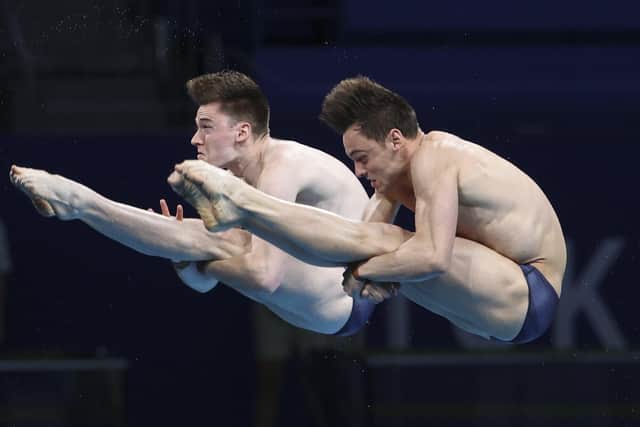 Tom Daley and Matty Lee dive their way to gold in the Men's Synchronised 10m Platform Final at Tokyo Aquatics Centre. Picture: Jean Catuffe/Getty Images