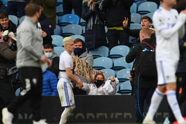 A young fan smiles after Ezgjan Alioski gives her his shirt after the Premier League clash against West Bromwich Albion at Elland Road in May 2021. PIC: Getty
