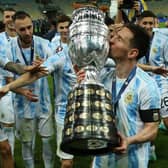 Lionel Messi celebrates with the Copa America trophy. Pic: Getty