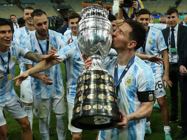 Lionel Messi celebrates with the Copa America trophy. Pic: Getty