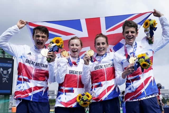 Great Britain's Alex Yee, Georgia Taylor-Brown Jessica Learmonth and Jonathan Brownlee on the podium with the gold medal for the Triathlon Mixed Relay at Odaiba Marine Park on the eighth day of the Tokyo 2020 Olympic Games in Japan.