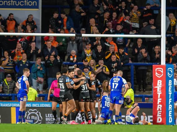 Tigers celebrateGreg Eden's second try in the win at Leeds. Picture by Bruce Rollinson.